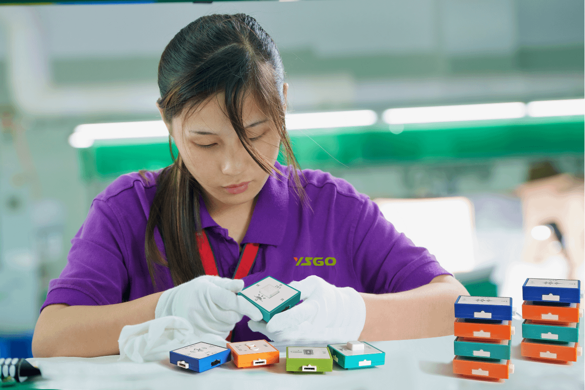factory worker checking the stem toys
